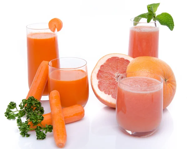 Composizione con succhi di carota e pompelmo — Foto Stock