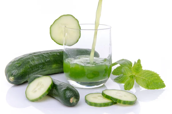 Composition with cucumber juice poured into a glass — Stock Photo, Image