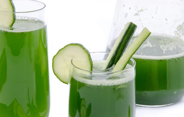 Composition with two glasses and a jug of cucumber juice — Stock Photo, Image