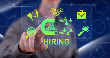 Adam dokunmatik ekranda işe alım konseptine parmağıyla dokunuyor.