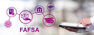 Man using a tablet with fafsa concept clipart