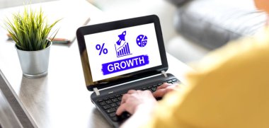 Bir büyüme kavramını gösteren dizüstü bilgisayar