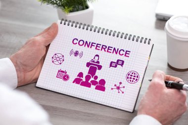 Konferans konsepti olan bir not defteri.