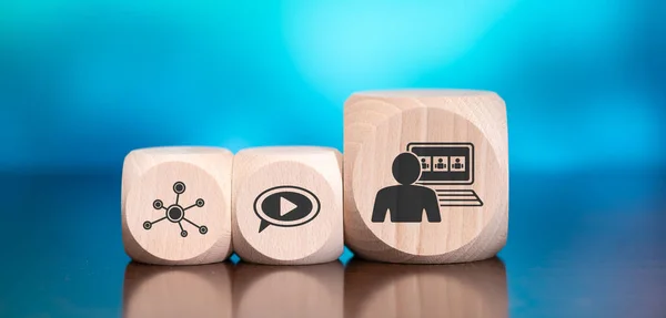stock image Wooden blocks with symbol of video conference concept on blue background