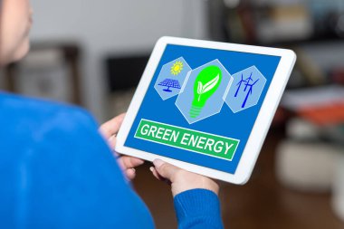 Yeşil enerji kavramını gösteren tablet ekranı