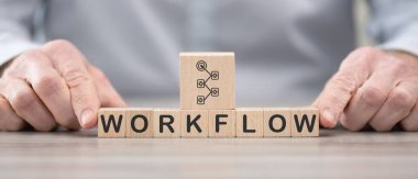 İş akışı kavramının sembolü olan tahta bloklar