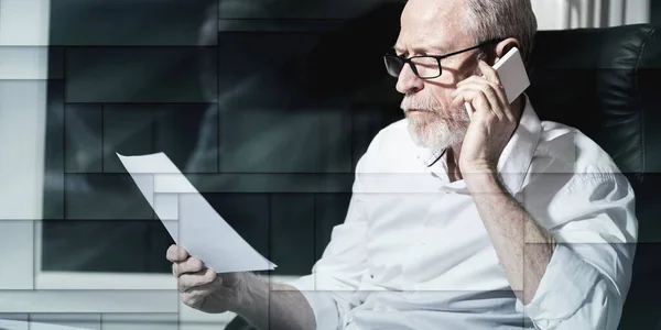 Bearded Senior Businessman Talking Mobile Phone Office Hard Light Geometric — Stockfoto