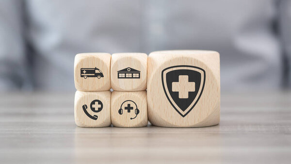 Wooden blocks with symbol of emergency concept