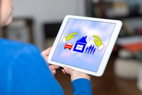 Tablet Screen Displaying Family Home Car Insurance Concept — Stock Photo, Image