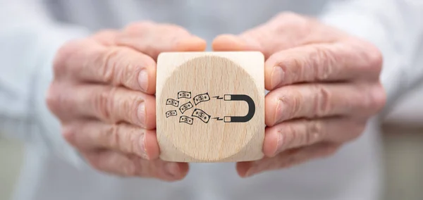 Hand Holding Wooden Cube Symbol Investors Attraction Concept — ストック写真