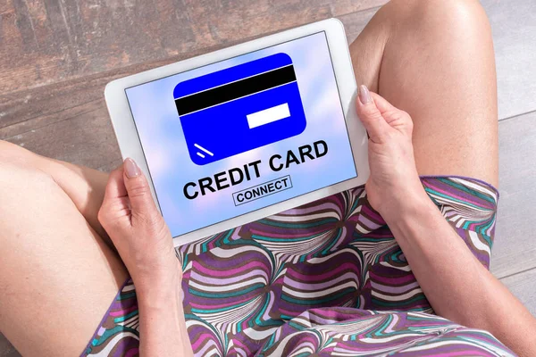 Woman Sitting Floor Tablet Showing Credit Card Concept — Stok fotoğraf