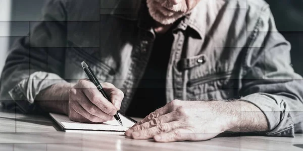 Mature Man Taking Notes Notebook Geometric Pattern — Foto de Stock