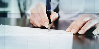 Businesswoman signing a document at office, geometric pattern