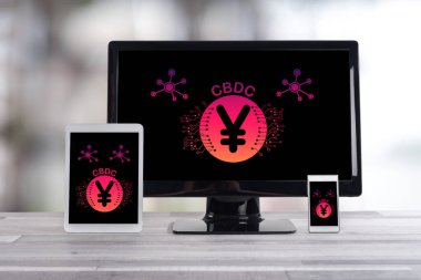 Cbdc concept shown on different information technology devices