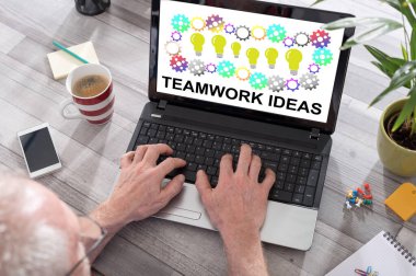 Teamwork idea concept shown on a laptop used by a man