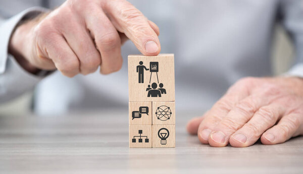 Wooden blocks with symbol of workshop concept