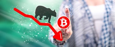 Dokunmatik ekranda bir bitcoin 'e dokunan kadın ayı eğilimi kavramı parmaklarıyla