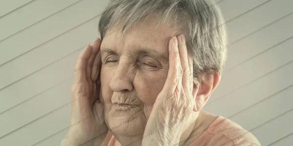 Senior Woman Headache Holding Her Forehead Geometric Pattern — Stock Photo, Image