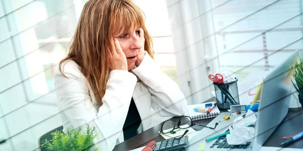 Overworked Mature Businesswoman Sitting Messy Desk Geometric Pattern — Fotografia de Stock