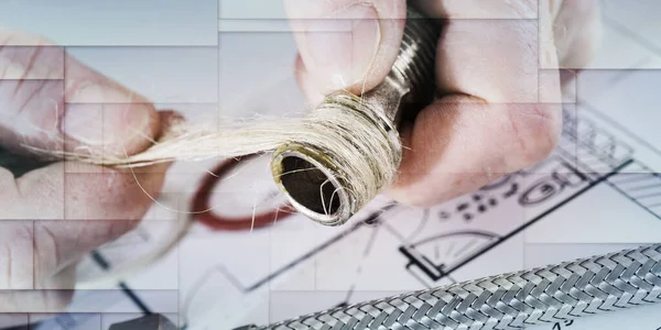 Plumber putting hemp fibers on a thread, closeup, geometric pattern