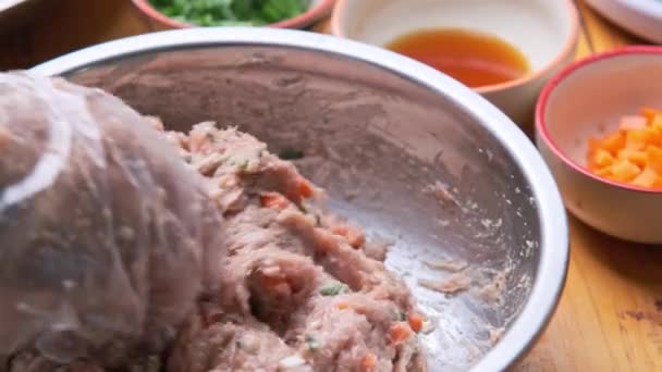 Woman Hands Disposable Plastic Glove Mixing Raw Marinated Pork Chops — Stockvideo