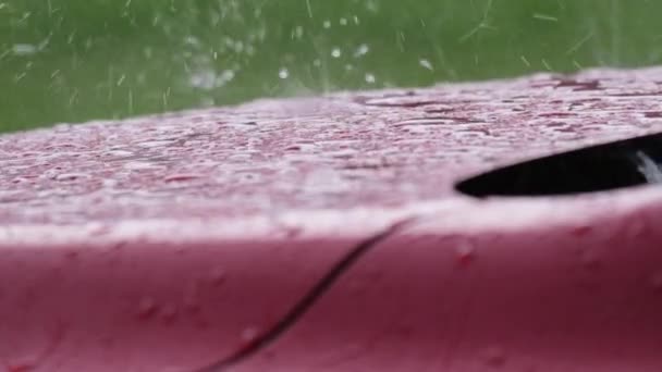 Slow Motion Close Falling Rain Bouncing Raindrops Red Car Hood — Stockvideo