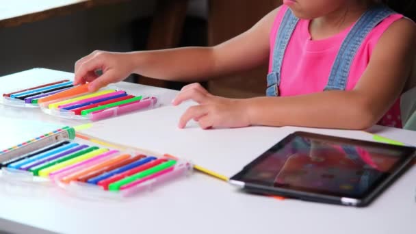 Cute Little Girl Holding Magic Pen Drawing Paper Digital Tablet — Stock videók