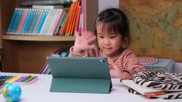 Cute Little Girl Holding Stylus Pen Working Tablet Child Using — Stockvideo