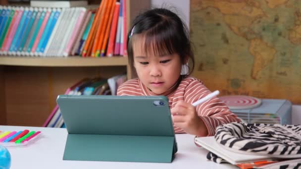 Cute Little Girl Holding Stylus Pen Working Tablet Child Using — Stock videók