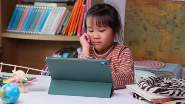Cute Little Girl Holding Stylus Pen Working Tablet Child Using — Stockvideo