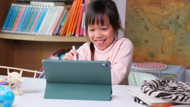 Cute Little Girl Holding Stylus Pen Working Tablet Child Using — Stock videók