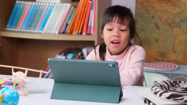 Cute Little Girl Holding Stylus Pen Working Tablet Holding Wooden — Stockvideo