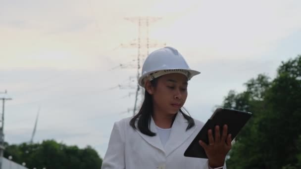 Asian Female Electrical Engineer Thumbs Smiles Wind Turbine Background Electric — Video