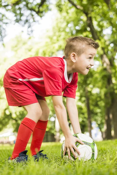 Piłka nożna szczęśliwy chłopiec — Zdjęcie stockowe