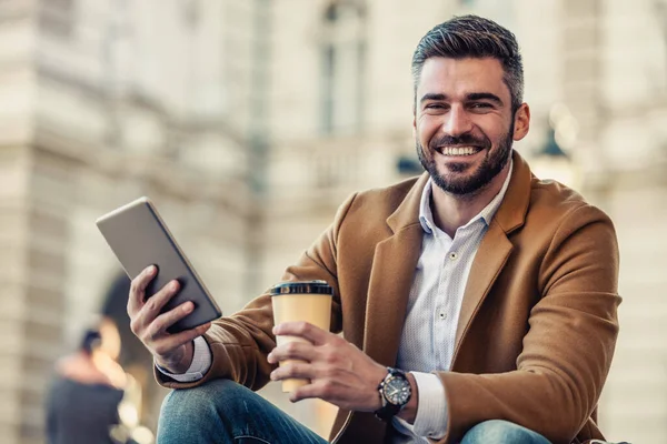 Man Using Digital Tablet While Sitting City Street Modern Technology — Fotografia de Stock
