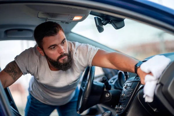 Young Man Taking Care Cleaning Interior His New Car — Stockfoto