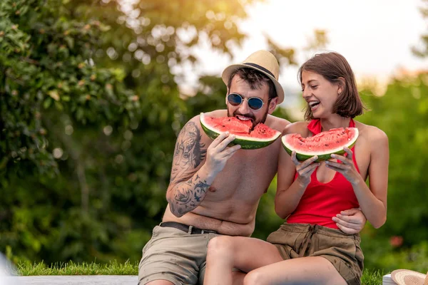 Happy Couple Relaxing Vacation Eating Watermelon Swimming Pool — Foto de Stock