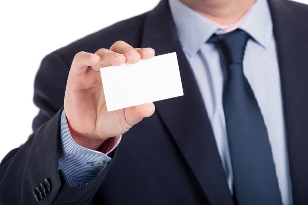 Επιχειρηματίας δείχνει επαγγελματική κάρτα, ρηχή τμήμα τομέα, απομονωμένη — Φωτογραφία Αρχείου