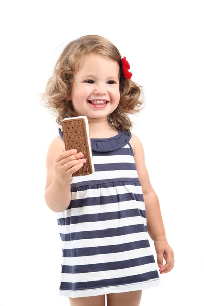 Smiling little girl eating ice cream, isolated — Stock Photo, Image