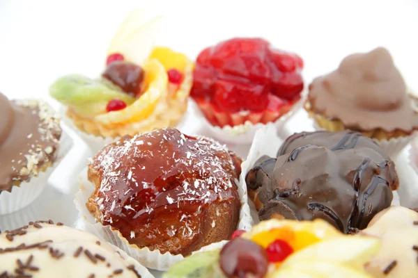 Close up of small cakes with with different stuffing — Stock Photo, Image