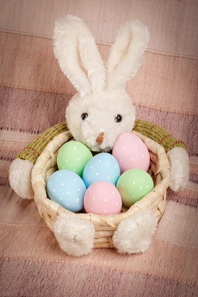 Easter basket with decorated eggs and the Easter bunny — Stock Photo, Image