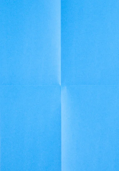 Blaues Blatt Papier gefaltet in vier — Stockfoto