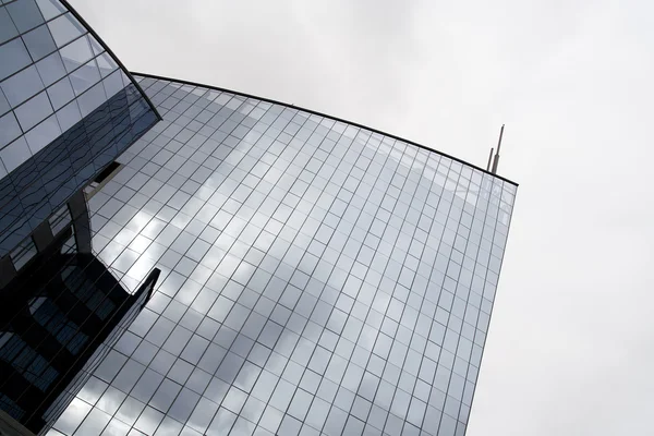 Glass wall of office buildings, modern glass silhouettes — Stock Photo, Image