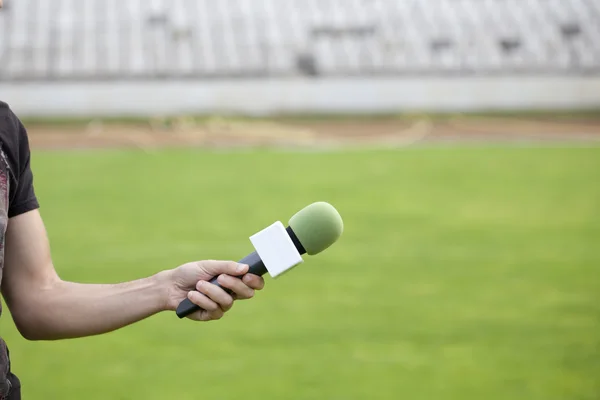 Reporter takes interview after the match — Stock Photo, Image