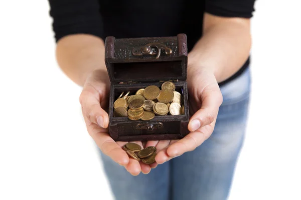 Woman hands holding old antique treasure chest with gold coins — Stock Photo, Image