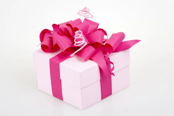 Gift box with pink ribbon bow — Stock Photo, Image