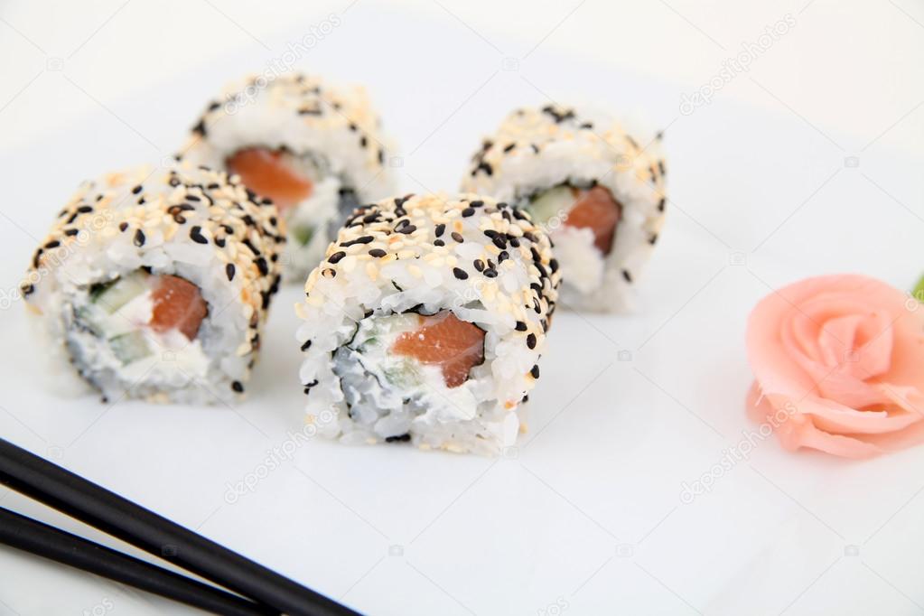 Uramaki with salmon.  Traditional japanese sushi rolls