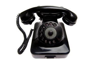 Beyazda izole edilmiş eski model telefon