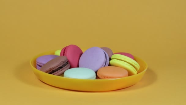 Woman Hand Take Delicious Colorful French Macaroons Plate — Vídeo de stock