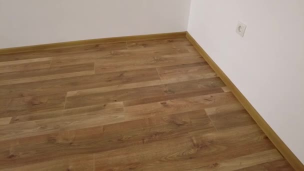 Novo Piso Laminado Parquete Laminado Com Textura Madeira Marrom — Vídeo de Stock